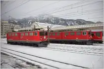 Ge 6/6 II 702  Curia  und 704  Davos  begegnen sich in Landquart. (19.01.2016)