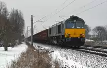 266 105 der Captrain rollte am 17.01.16 mit dem Leerkohlezug von Helmstedt kommend durch Greppin nach Profen.