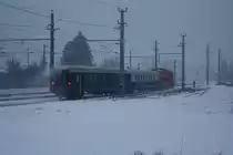 NLB 2143 070-7 fährt am 23.Jänner 2016 aus dem Bf. Korneuburg.