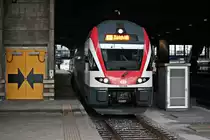 Ausfahrt am 25.10.2014 von RABe 511 016 als IR (Basel SBB - Zürich HB) aus dem Startbahnhof.