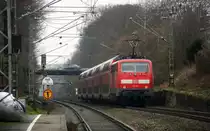 Ein Nachschuss von der 111 155 DB schiebt den RE4  aus Aachen-Hbf nach Dortmund-Hbf kommt aus Richtung Aachen-West,Laurensberg,Richterich, und fährt durch Kohlscheid in Richtung Herzogenrath,Mönchengladbach,Neuss. 
Aufgenommen vom Bahnsteig 2 in Kohlscheid.
Bei Regenwolken am Mittag vom 5.2.2016.