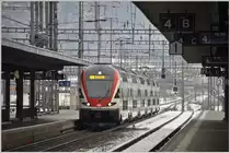 RE5066 mit 511 021  erreicht Landquart. (04.02.2016)