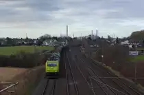 Vor der Skyline von Ineos zieht hier 119 004-9 ihren Keselzug In Richtung Köln-Longerich. Köln Worringen (12.02.2016)