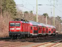 112 101 mit einem RE 5 nach Rostock am 13. Februar 2016 auf dem Südlichen Berliner Außenring bei Diedersdorf.