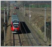 Talentbegegnung am 11.3.2007 kurz vor Gramatneusiedl auf der Ostbahn. Im Vordergrund ist ein Zweistystemtalent der BR 4124 als REX 2619 von Wien-S�d Ostseite nach Neusiedl am See zu sehen und im Hintergrund REX 2620 von Neusiedl am See nach Wien-S�d Ostseite.