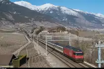 Re 460 047 befindet sich am 19. März 2016 mit einem IR zwischen Salgesch und Sierre.