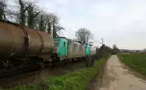 Ein Bilck auf zwei Cobra 2826 und 2820  sie kommen die Gemmenicher-Rampe hinunter nach Aachen-West mit einem Kesselzug aus Antwerpen-Petrol(B) nach Basel-SBB(CH). Aufgenommen an der Montzenroute am Gemmenicher-Weg.
Bei Sonne und Wolken am Mittag vom 2.4.2016.