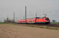 182 019 schob am 03.04.16 eine RB/S2 von Leipzig-Connewitz nach Magdeburg. Hier hat sie den Bahnhof Güterglück bereits verlassen und ist nun auf dem Weg nach Magdeburg.