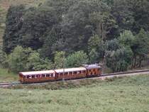 Zug auf dem 4,2 km langen Weg zur�ck vom Gipfel ins Tal.
Die maximale Neigung der Strecke betr�gt 25%.

23.09.2004

