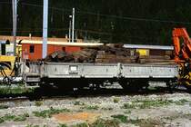 RhB - Kkl 7046 am 26.08.1998 in Preda - Niederbordwagen 2-achsig mit 1 offenen Plattform - Baujahr 1903 - MAN - Gewicht 5,14t - Zuladung 10,00t - L�P 7,49m - zul�ssige Geschwindigkeit Aufkleber 60/B km/h - �2=29.09.1987 - Lebenslauf: ex M 1176 - 1911 M 7046 - 1969 Kkl 7046 - 05/2000 P 10057 Fa. Laich.
