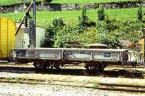 RhB - Kkl 7052 am 28.08.1995 in Poschiavo - Niederbordwagen 2-achsig mit 1 offenen Plattform - Baujahr 1903 - MAN - Gewicht 5,20t - Zuladung 10,00t - L�P 7,49m - zul�ssige Geschwindigkeit Aufkleber 60/B km/h - �=08.08.198? - Lebenslauf: ex M 1182 - 1911 M 7052 - 1969 Kkl 7052 - 05/1998 Abbruch.
