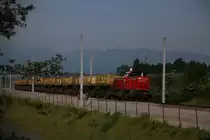 DH 1700.1 auf dem Weg nach Kalsdorf mit einem beladenen Abraumzug von der Baustelle zum Koralmtunnel am 27.05.2016 auf Höhe Selbstblock HEN 1 bei Wettmanstätten  