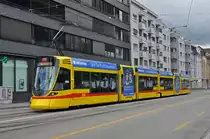 Be 6/10 Tango 164, mit einer Teilwerbung für die Securitas, fährt zur Haltestelle der Linie 11 am Voltaplatz. Die Aufnahme stammt vom 24.05.2016.