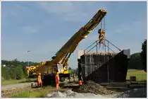 Einsatz Kirov Kran KRC 1200 am 28.5.2016 anlässlich der Neuerrichtung eines Durchlasses bei der GKB-Haltestelle Oisnitz-St. Josef.
