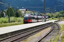 4024 123-4 als S1 4256 (Lienz - Friesach), am 25.5.2016 beim Halt in Oberdrauburg.
