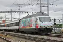 Re 460 099-5, mit einer Mobiliar/Gottardo 2016 Werbung, durchfährt den Bahnhof Muttenz. Die Aufnahme stammt vom  30.05.2016.