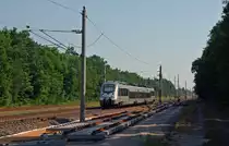 1442 106 passiert am 05.06.16 die noch nicht eingebaute Weiche auf Höhe der Baustelle in Burgkemnitz. Im Hintergrund befindet sich die Baustelle wo diese Weiche noch eingesetzt wird. 
