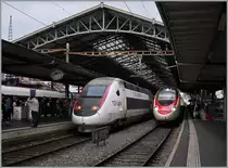 Während der SBB RABe 503 nach Venezia in Lausanne eintrifft, verbreitet der TGV Lyria sportliche Werbung.
Lausanne, den 8. Juni 2016