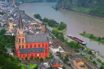 Vom Aussichtspunkt der Burg Schönburg hat man eine tolle Sicht auf den Bahnhof von Oberwesel und das Rheintal. Ein Trans Regio der Mittelrein Bahn fährt aus Richtung Koblenz nach Bingen. Fotografiert am 3 Juni 2016 mit meiner kleine Canon Klick klack im Miniatur Modus.