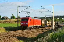 145 061-8 mit einem gemischten Güterzug in Zschortau, am 18.06.2016.
