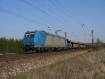 Die logolose TXL-Lok 185 520-4 ist am 26.3.07 gegen 10:45 Uhr bei Drakenburg auf der KBS 380 Richtung Hannover unterwegs.