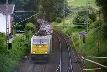 186 178-0  der Euro Cargo Rail kommt aus Richtung Aachen-West und fährt die Gemmenicher-Rampe hoch mit einem Schrottzug aus Köln-Kalk(D) nach Genk-Goederen(B) und fährt gleich in den Gemmenicher-Tunnel hinein und fährt in Richtung Montzen/Vise(B). 
Aufgenommen in Reinartzkehl an der Montzenroute.
Am Nachmittag vom 11.7.2016.