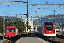 TRAVYS/YStC/SBB: Momentaufnahme einer Begegnung vom 19. Juli 2016 zwischen einem RABDe 500 (ICN) und dem Gütertriebwagen Be 4/4 1 in Yverdon-les-Bains.
Foto: Walter Ruetsch  