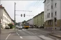 . Die Bebauung ist weitgehend geblieben -

Die Situation in der Schmidener Straße in Stuttgart-Bad Cannstatt an der Linie im Bild von Kurt des Jahres 1979:

http://www.bahnbilder.de/bild/deutschland~strassenbahn~stuttgart-keine-stadtbahn/609200/stuttgart-ssb-sl-2-dot4-915.html

Für die breitere Stadtbahn wurde, um nicht auf den Straßenfahrbahnen fahren zu müssen eine Gleisverschlingung gebaut, die im Rücken des Fotografen in die Seitenlage wechselt:

http://www.bahnbilder.de/bild/deutschland~stadtbahnen-und-u-bahnen~stadtbahn-stuttgart-haltestellen-und-strecken/40417/-eine-der-beiden-engstellen-des.html

27.07.2016 (m)