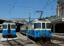MOB: Die Regionalzüge nach Zweisimmen und von Les Avants mit den ABDe 8/8 4003  Bern  und ABDe 8/8 4004  Fribourg  beim Zusammentreffen in Montreux am 19. Juli 2016.
Foto: Walter Ruetsch