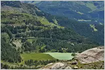 BerninaExpress 951 verlässt soeben die Station Alp Grüm. (18.07.2016)
