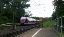 Zwei Euregiobahn (RB20) kommen aus Langerwehe-Stolberg-Altstadt nach Alsdorf aus Richtung Aachen-West,Laurensberg,Richterich und halten in Kohlscheid und fahren in Richtung Herzogenrath. 
Aufgenommen von Bahnsteig 2 in Kohlscheid.
Am Nachmittag vom 5.8.2016.
