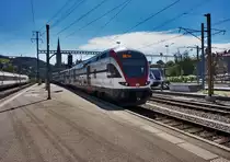 RABe 511 023  Graubünden  fährt als RE 4979  RHEINTAL-EXPRESS  (Wil SG - St. Gallen - Chur), in den Bahnhof St. Gallen ein.
Aufgenommen am 18.7.2016.