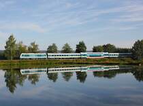 Die 223 067 mit einem ALEX nach München am 28.08.2016 unterwegs bei Wiesau.
