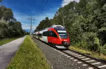 4024 122-6  Sonnenstaadt Lienz  fährt als S1 4236 (Lienz - Friesach), zwischen Dölsach und Nikolsdorf vorüber.
Aufgenommen am 2.9.2016.
