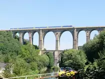 RE 3 Chemnitz - Leipzig bei der Fahrt über das Göhrener Viadukt am 18. August 2016.