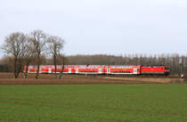 Am 9. März 2012 konnte ich den mit 112 162 bespannten RE 7 südlich von Köln-Worringen ablichten.