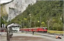 RE1752 mit Ge 4/4 II 613  Domat/Ems  in Versam-Safien. (13.10.2016)