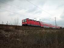 143 144-4 mit einen RB in Richtung Halle/Leipzig auf der KBS 250 zwischen Gr�fenhainichen und Burgkemnitz.