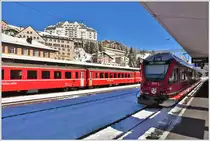 RE1334 durch den Vereina nach Landquart mit ABe8/12 3513 in St.Moritz. (08.11.2016)