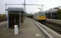 186 310-9  der Euro Cargo Rail kommt durch Herzogenrath aus Richtung Neuss mit einem Schrottzug aus Köln-Kalk(D) nach Genk-Goederen(B) und fährt in Richtung Kohlscheid,Richterich,Laurensberg,Aachen-West. 
Aufgenommen vom Bahnsteig 2 in Herzogenrath.
Am Nachmittag vom 12.11.2016.
