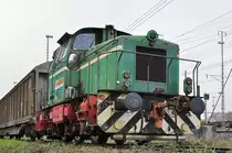 Em 3/3 837 802-8 steht auf einem Nebengleis beim Bahnhof Muttenz. Die Aufnahme stammt vom 13.11.2016. 