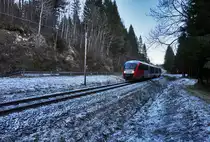 5022 021-7 fährt als R 4827 (Villach Hbf - Kötschach-Mauthen) zwischen St. Daniel und Kötschach-Mauthen vorüber.
Aufgenommen am 8.12.2016.