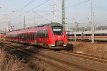 442 357 als S3(Warnem�nde-G�strow)bei der Ausfahrt im Rostocker Hbf.16.12.2016