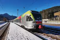 ETR 170 007  James Bond  hält als REX 1853, auf der Fahrt von Fortezza/Franzensfeste nach Lienz, im Grenzbahnhof San Candido/Innichen.
Aufgenommen am 23.12.2016.