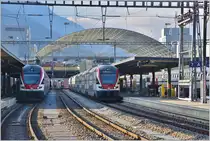 RE4870 nach Wil mit 511 038, RE5068 nach Zürich HB mit ZVV 511 035 in Chur. (12.12.2016)
