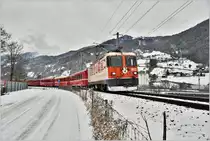 RE1245 nach Scuol-Tarasp mit Ge 4/4 II 622  Arosa  in der Neugutkurve bei Landquart. (04.01.2017)