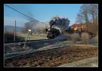 Die SZ Dampflok 33-037 fährt mit dem Weihnachtszug 15021 von Ljubljana nach Novo Mesto. Trebnje 17.12.2016