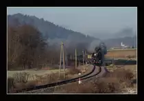 Die SZ Dampflok 33-037 fährt mit dem Weihnachtszug 15021 von Ljubljana nach Novo Mesto. 
Ivančna Gorica 17.12.2016