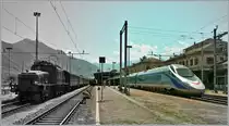 Reisezüge gestern und heute: die Ce 6/8 II 14253 mit ihrem Schnellzug  1930  und ein FS ETR 610 in Domodossola. 
20. August 2011
