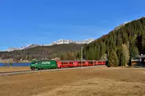 Ge 4/4 III 647 mit einem RE nach Davos Platz am 28.12.2016 bei Davos Dorf. 